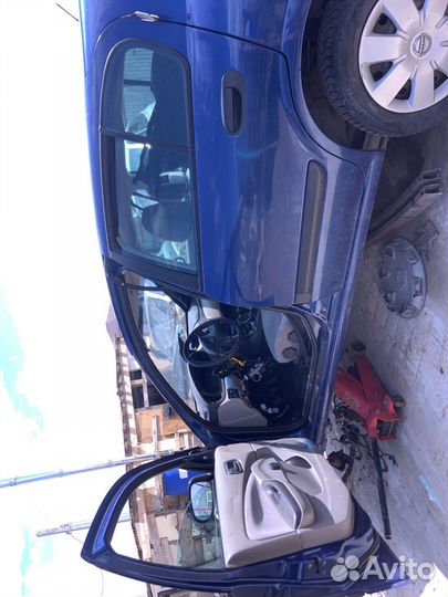 Двери Nissan Almera 2001год