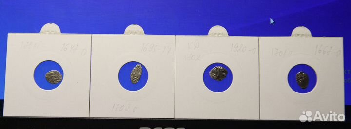 Серебряные монеты-чешуя Петра Первого