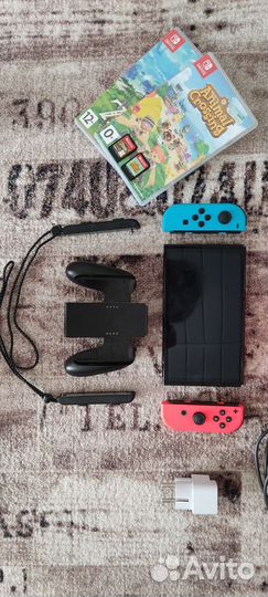 Nintendo Switch oled 64gb + 2 игры и переходник
