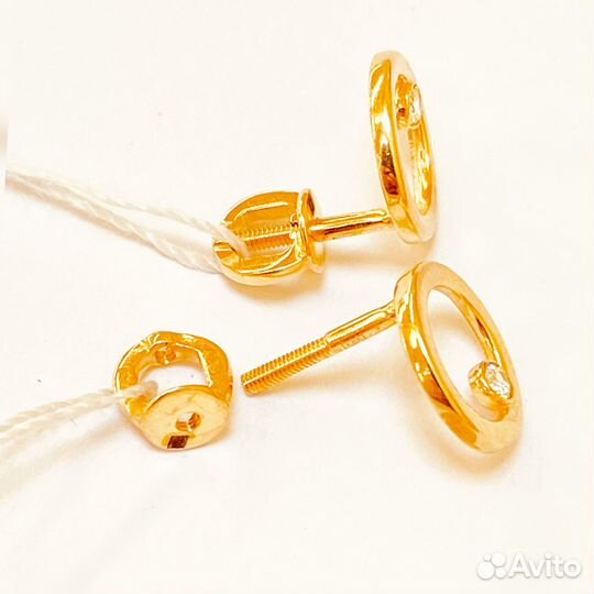 Золотые серьги с камнем