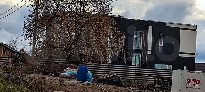Коттедж 311 м² на участке 18 сот.