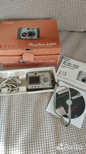 Фотоаппарат цифровой canon A520. работает от пальч