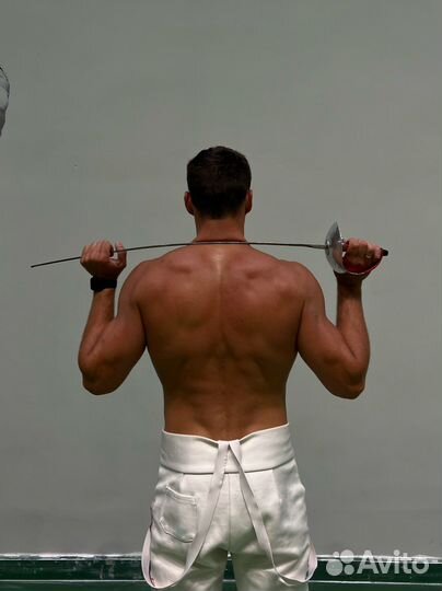 Тренер по фехтованию на саблях