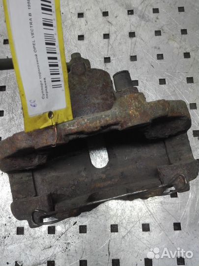 Суппорт передний левый Opel Vectra B