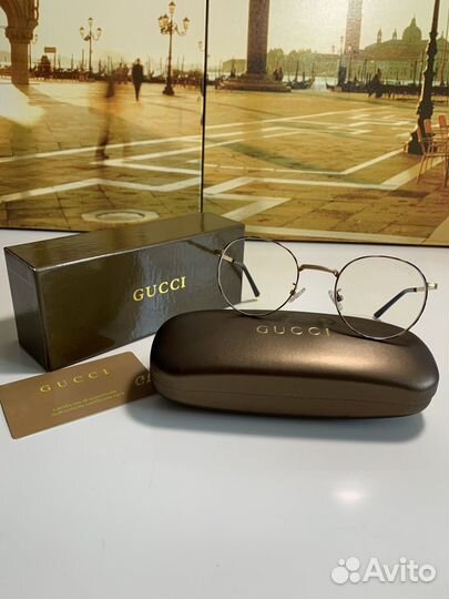 Солнцезащитные очки Gucci