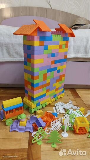 Пакетом Конструктор + кукла + книги + игрушка