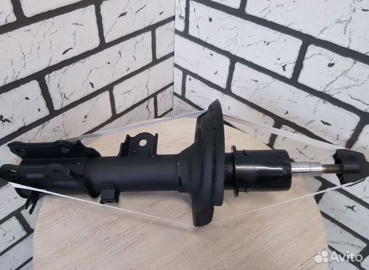 Автомобильный амортизатор киа передний лев