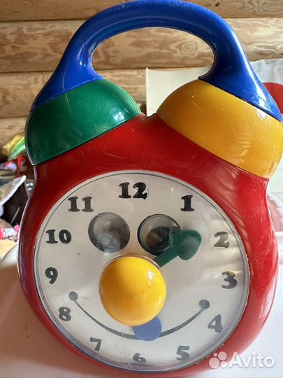 Игрушка музыкальная часы