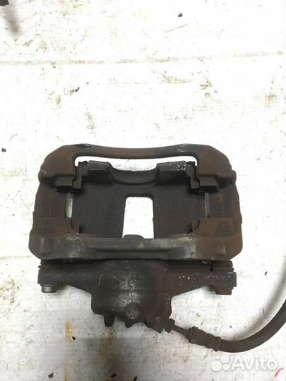 Суппорт тормозной передний левый Peugeot 207 EP6