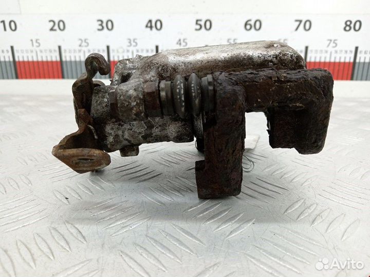 Суппорт задний правый для Opel Astra G 93176081