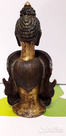 Старинная статуэтка будды