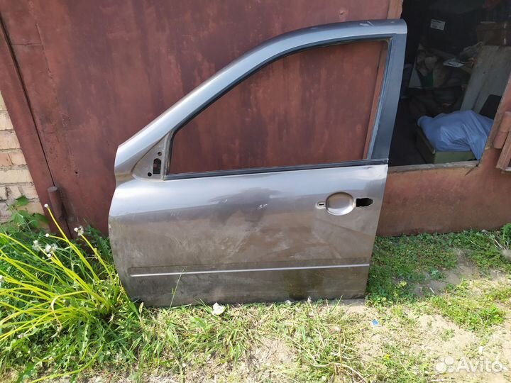 Дверь передняя левая на LADA granta