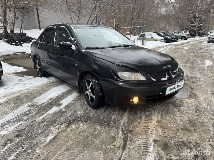 Mitsubishi Lancer 1.3 МТ, 2006, 325 800 км