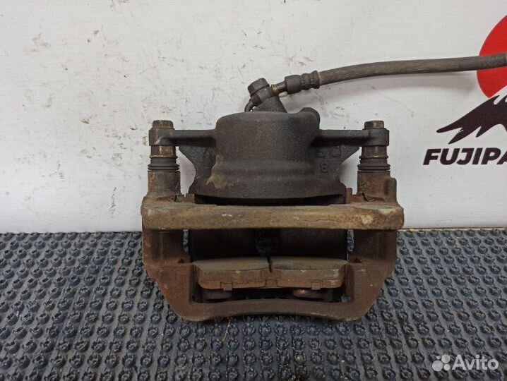 Суппорт тормозной передний правый Toyota Carina