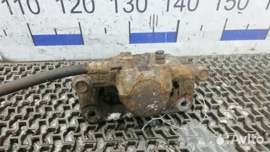 Суппорт тормозной задний левый KIA sorento 2 (CAD0