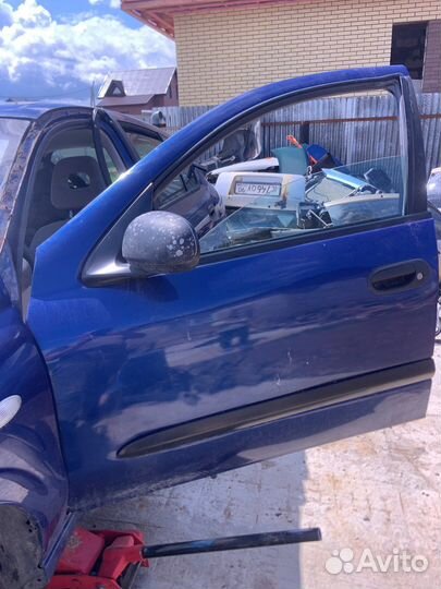 Двери Nissan Almera 2001год