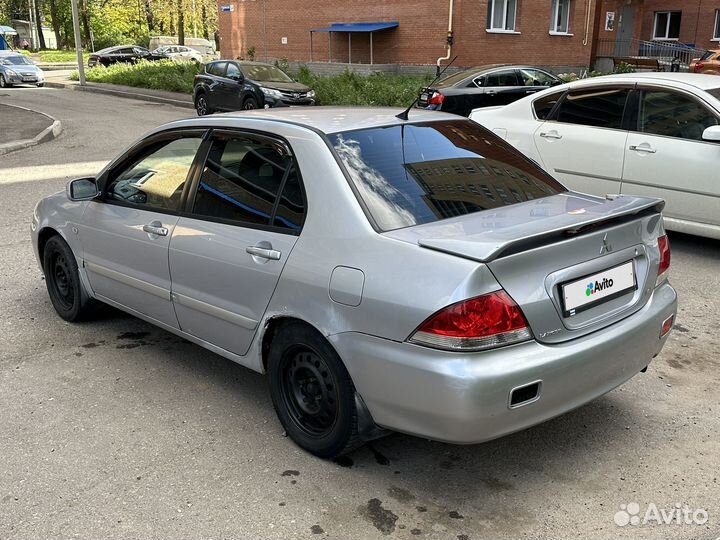 Mitsubishi Lancer 1.6 МТ, 2005, 200 000 км