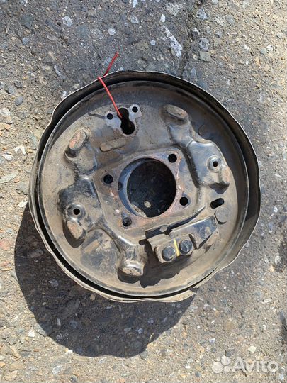 Кожух тормозного диска задний Nissan Tiida