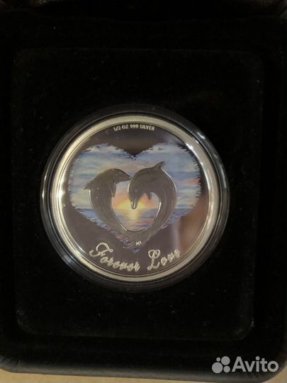 Серебряныая монета новая