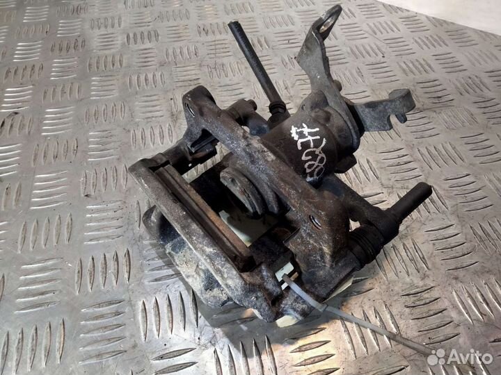 Суппорт задний правый Опель Астра J