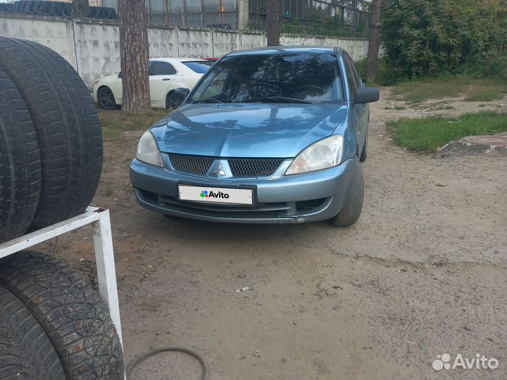 Mitsubishi Lancer 1.3 МТ, 2006, 271 500 км