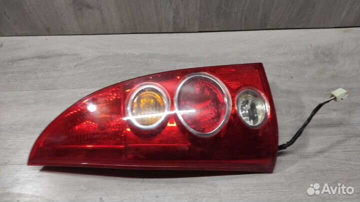 Фонарь левый Mazda Premacy