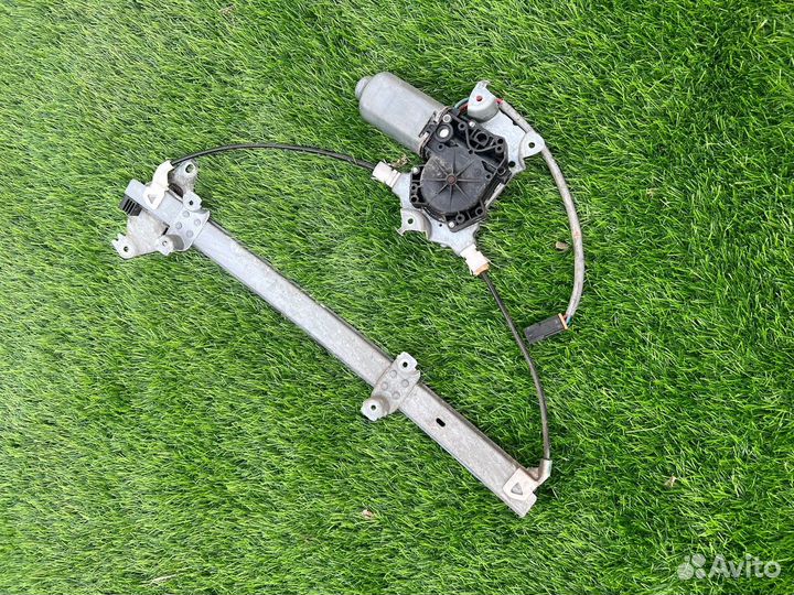 Стеклоподъемник передний левый primera p11