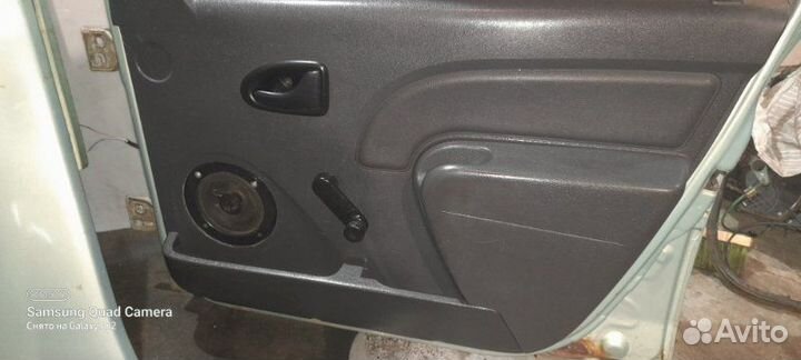 Обшивка двери передняя правая Renault Logan 1