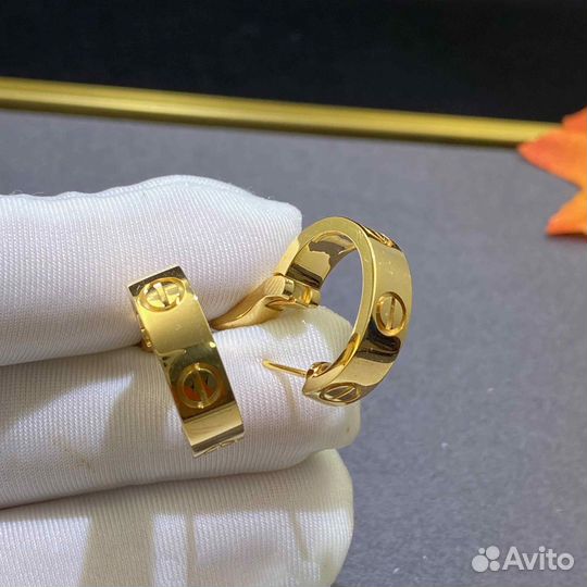 Золотые серьги Cartier