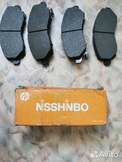 Тормозные колодки передние новые