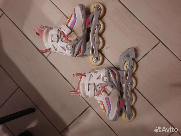 Роликовые коньки