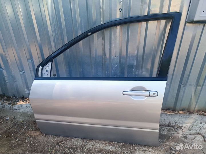 Передняя левая дверь Лансер 9