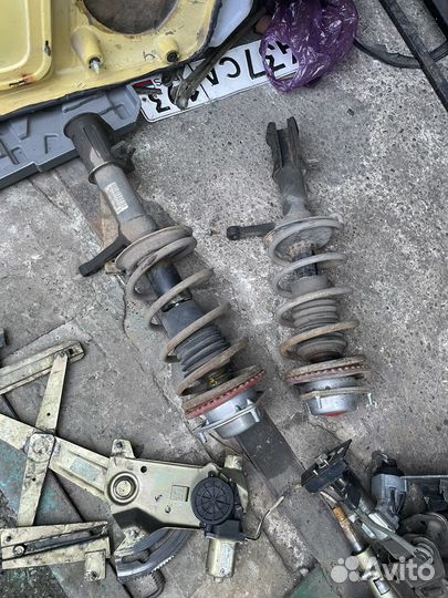 Передние стойки ваз 2112