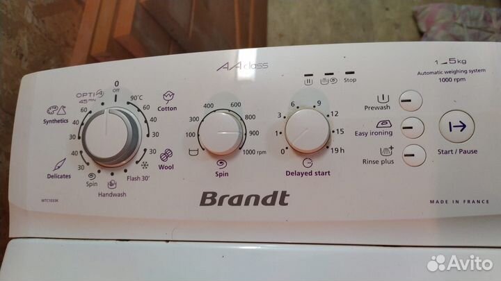 Стиральная машина с вертикальной загрузкой Brandt