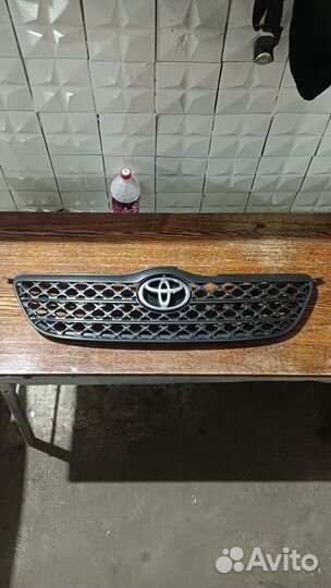 Решетка радиатора toyota corolla 120