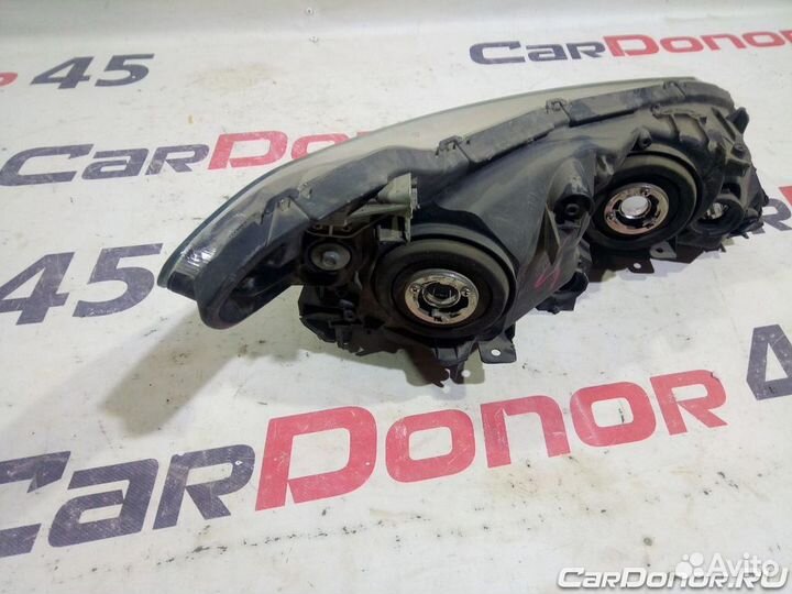 Фара головного света левая б/у для Honda Civic (33