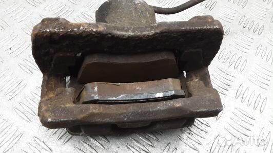 Суппорт тормозной передний левый chrysler PT cruis