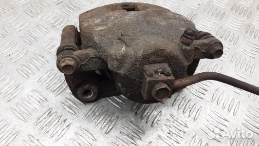 Суппорт тормозной передний левый chrysler PT cruis