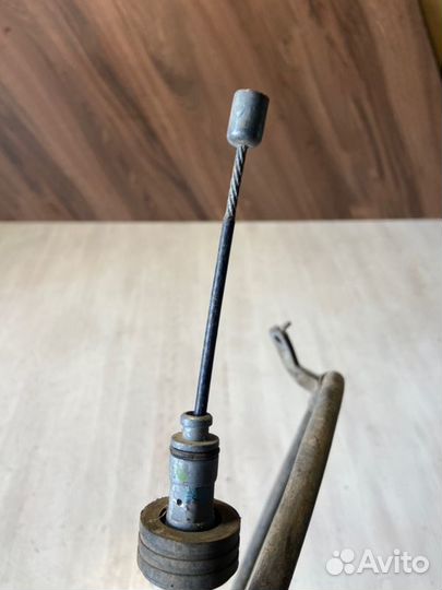 Трос стояночного тормоза левый Kia Rio 3