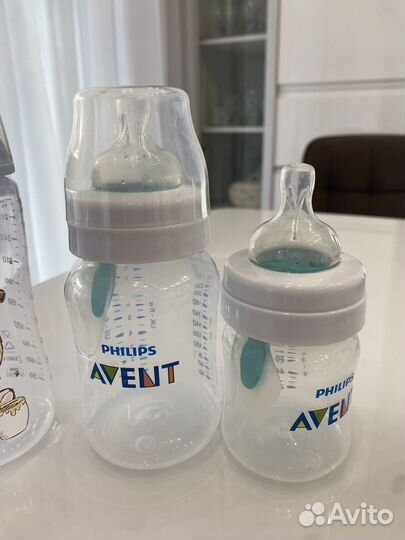 Молокоотсос и бутылочки