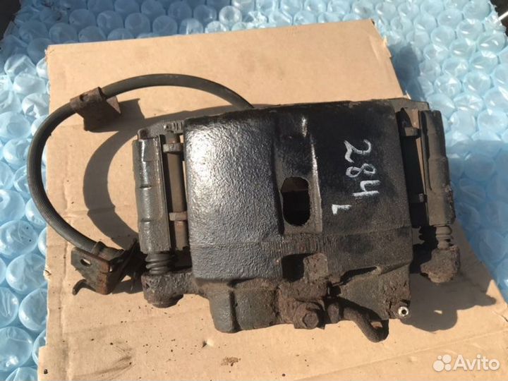 Суппорт передний левый Chevrolet Tahoe GM GMT800