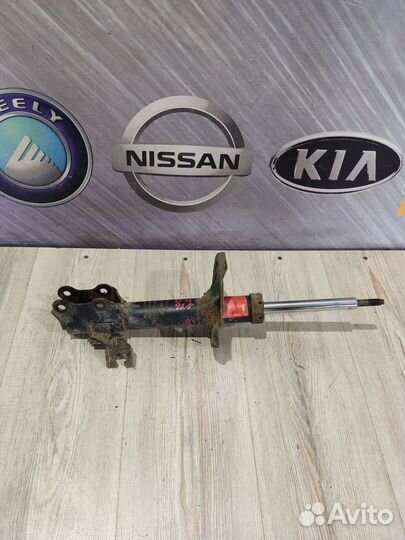 Амортизатор стойка перед Nissan almera N16 Прав
