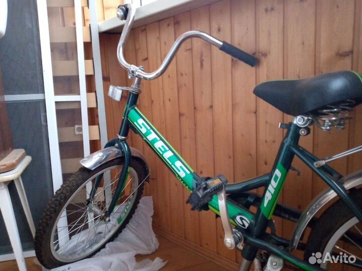 Велосипед Stels 410, черно-зелёного цвета, б/у