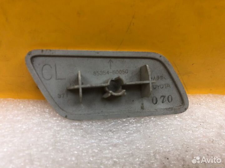 Крышка форсунки омывателя фар левая Toyota Land