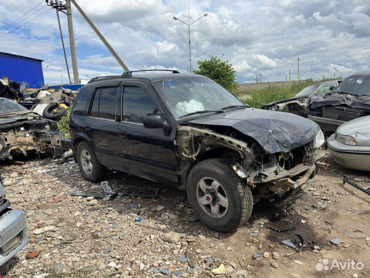 В разборе KIA Sportage FE 2.0 16V АКПП 2002г