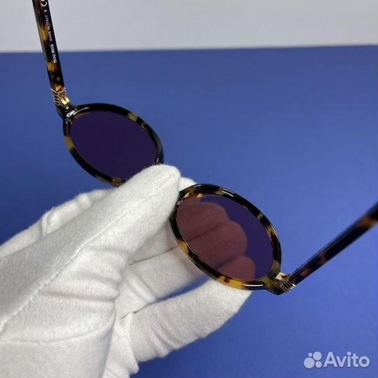 Очки Miu Miu Regard Sunglasses леопардовые