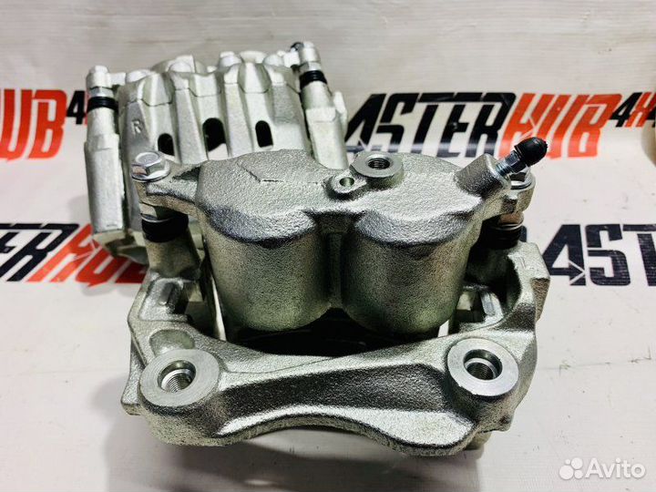 Суппорт передний левый toyota mark ii