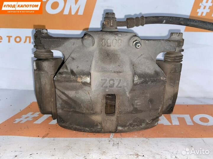 Суппорт тормозной передний левый Nissan X-Trail