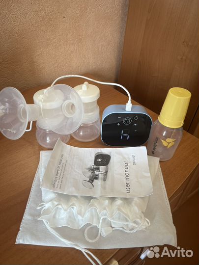 Молокоотсос электрический и medela бутылочка