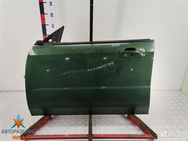 Обшивка двери передняя левая Subaru Impreza